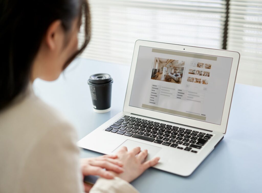 Girl looking at website on a computer